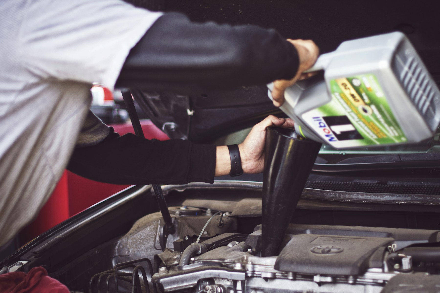 Open engine bay in a repair shop